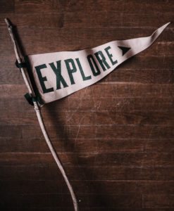 image of a flag with the words Explore