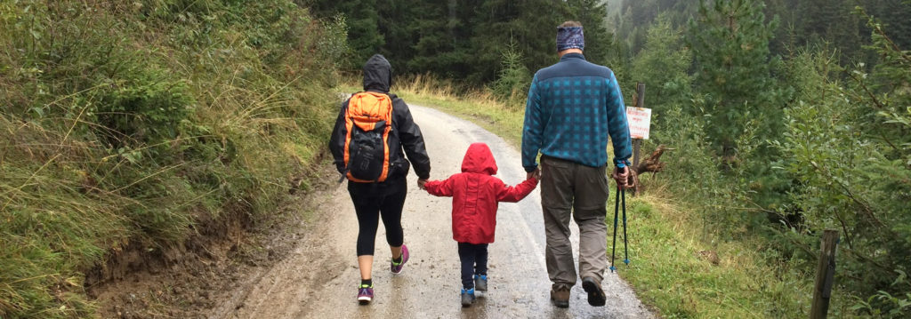 family hiking with their child